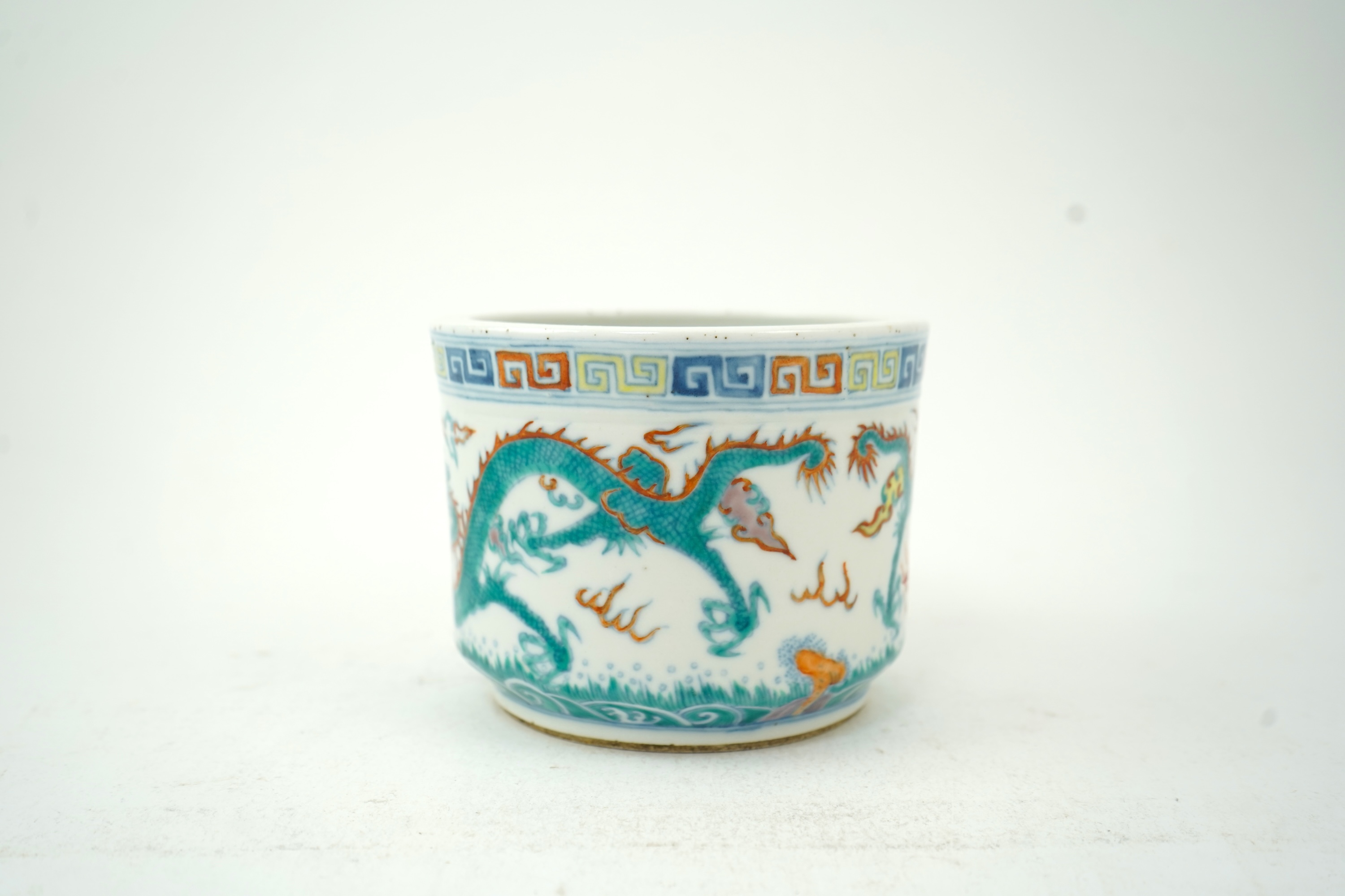 A Chinese doucai ‘dragon’ brushpot, Guangxu six character mark